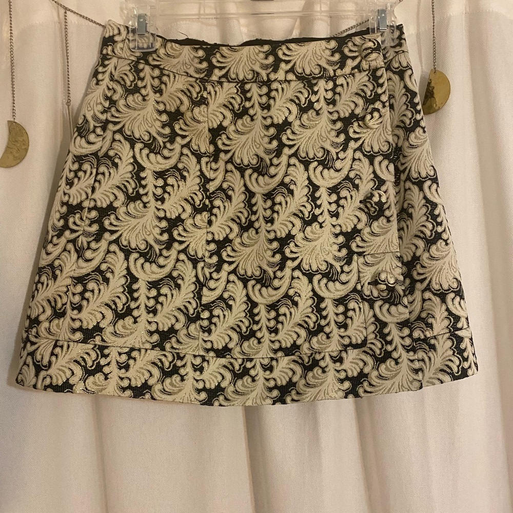 Brand new gold/black shimmery mini skirt